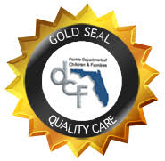 A gold seal quality care logo with the words " gold seal quality care ".